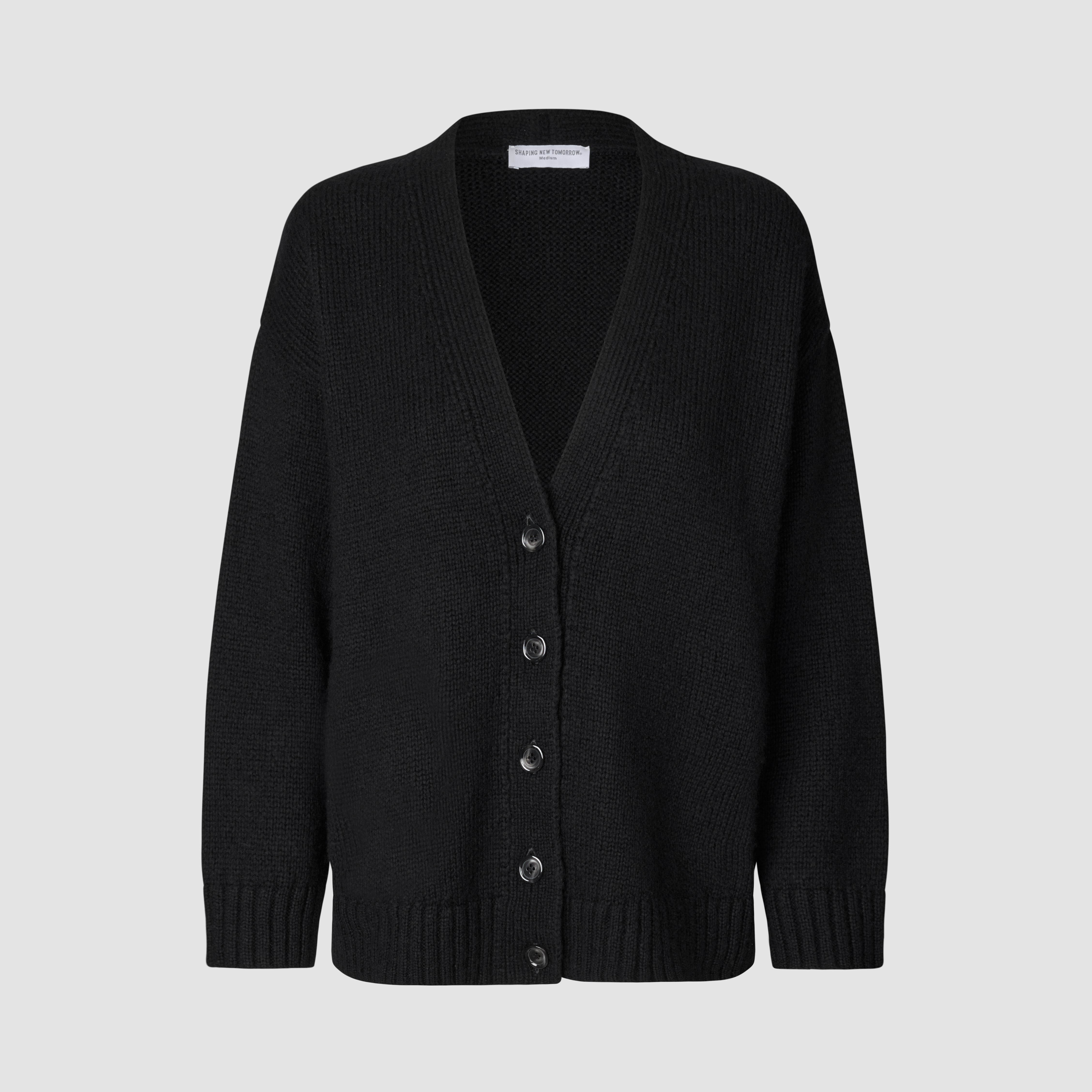 Women Chunky Soft Wool Knit Cardigan Black in a chunky knit V-neck style with front buttons and ribbed cuffs and hem.