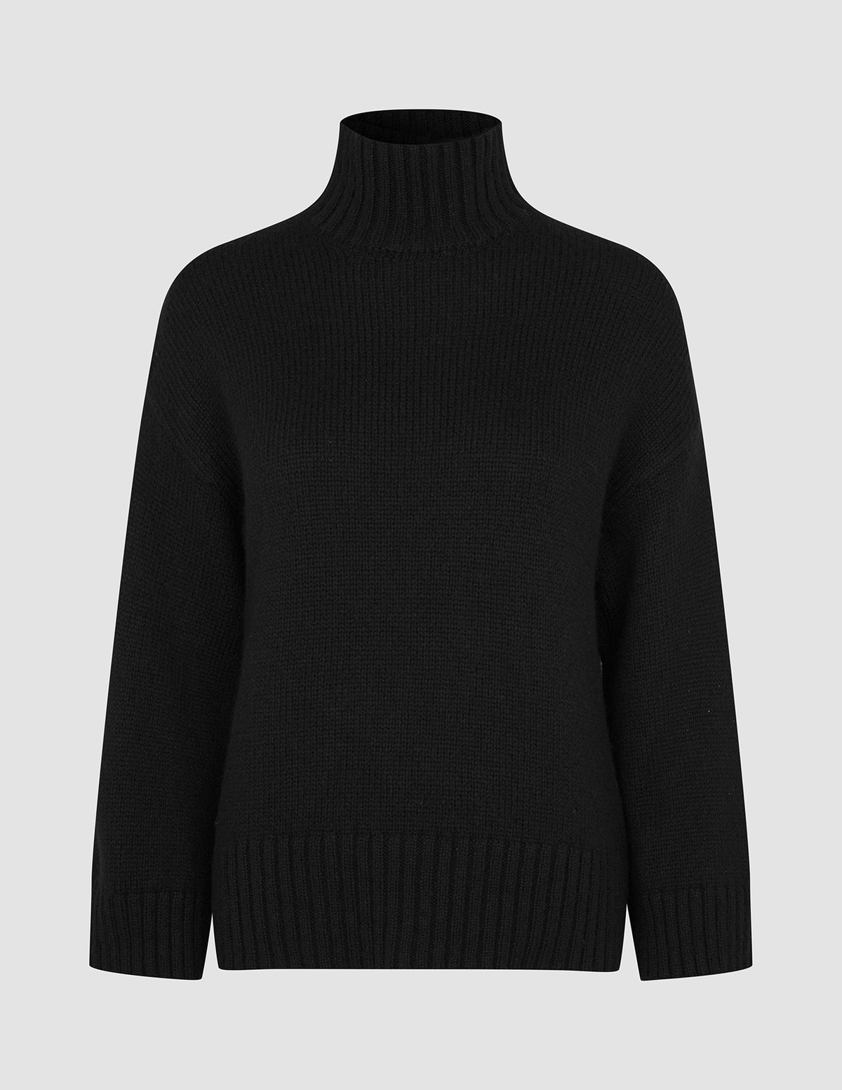 Women Chunky Soft Wool Knit Turtleneck Black chunky knit sweater featuring long sleeves and ribbed cuffs and hem.