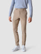 Model from the front wearing a pair of Essential Suit Pants Sand Grain/Beige