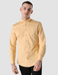 Model from the front wearing a Classic Shirt brick yellow