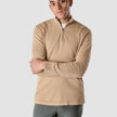 Model seen from the front wearing sand grain half zip in fine knit with a white t-shirt underneath