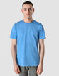 Model wearing azure t-shirt seen from the front