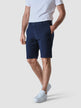 Model seen from the front wearing classic shorts marine blue