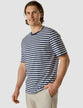Model wearing a navy striped box fit t-shirt