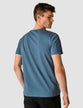 Model seen from the back wearing Cobalt Blue Autograph t-shirt the t-shirt has the company logo in white letering across the chest