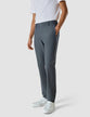 Model from the front wearing a pair of Tech Linen Elastic Pants Navy