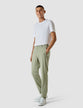 Model in full body wearing a pair of Tech Linen Elastic Pants Neutral Green