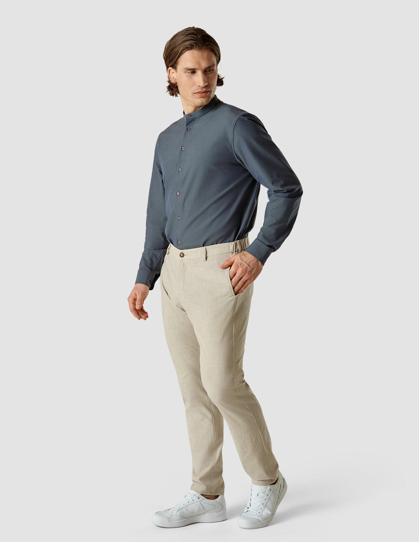 Model in full body wearing a Tech Linen Mandarin Long Sleeve Shirt Navy