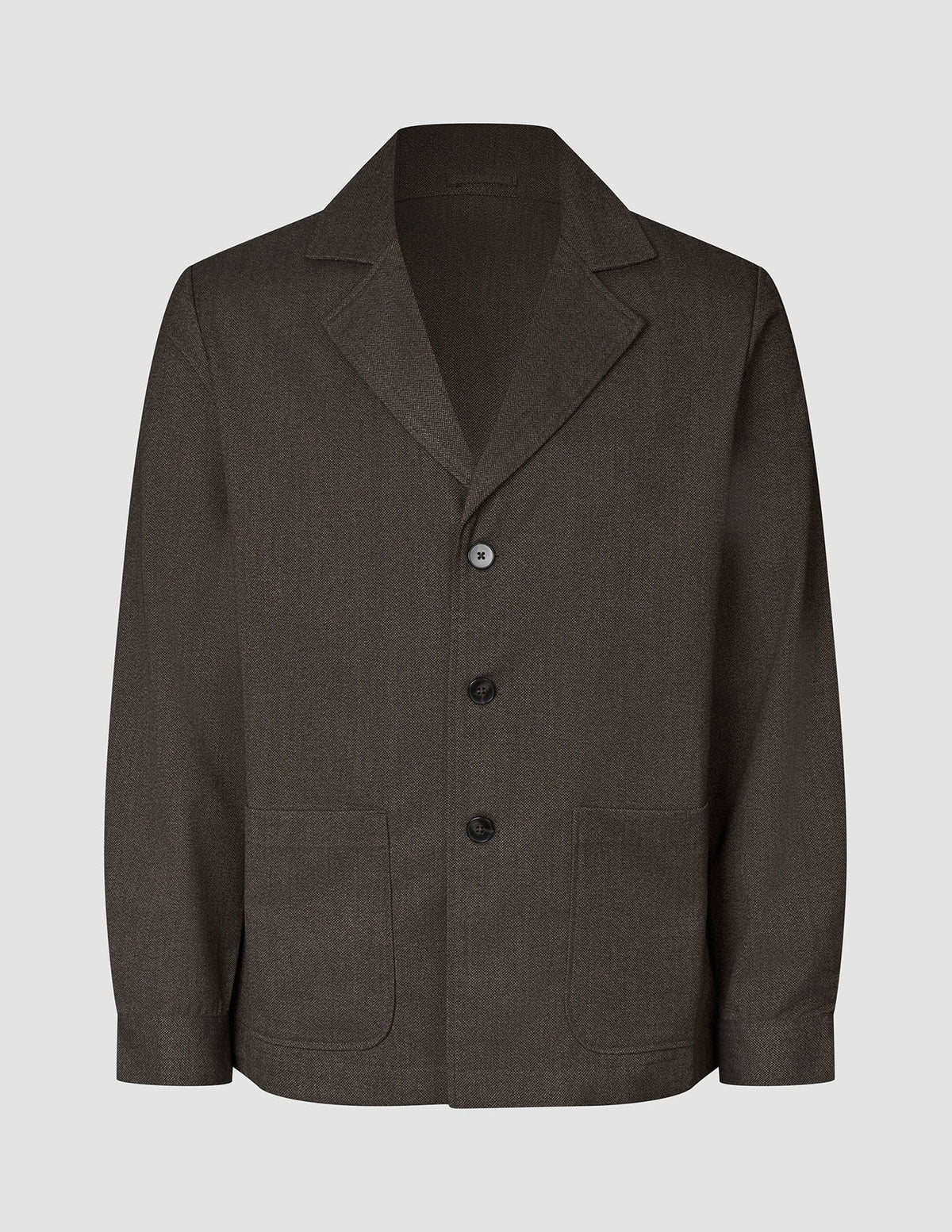 Atelier Overshirt in dark brown, a button-front blazer in heavyweight textured fabric featuring a notched lapel and two front patch pockets.