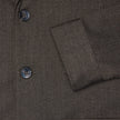 Atelier Overshirt Dark Brown in a heavyweight textured weave with a button-up front and cuffed sleeves.