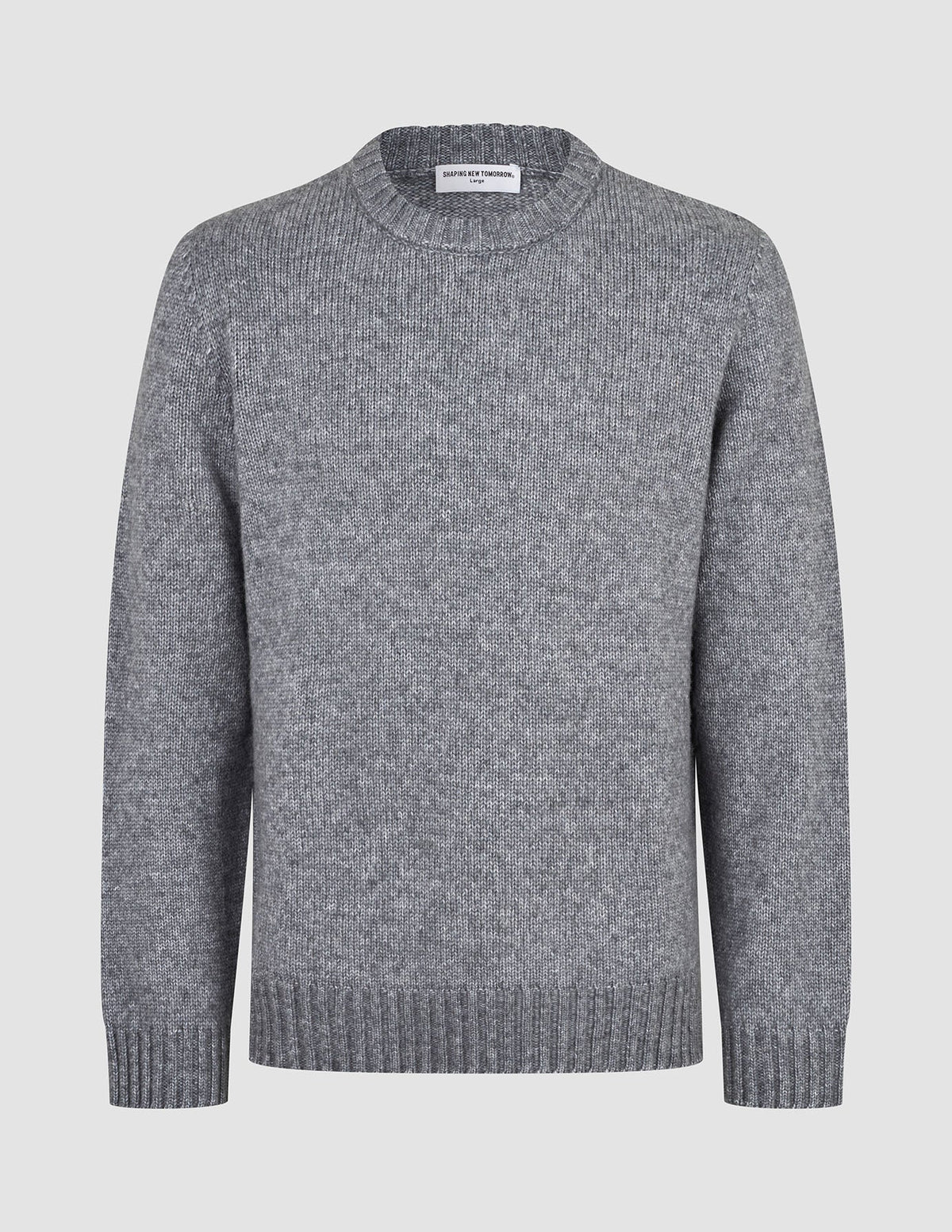 Chunky Soft Wool Knit Crewneck Glacier Grey sweater in a chunky, grey crewneck style with a classic Scandinavian design, ribbed cuffs, and hem.