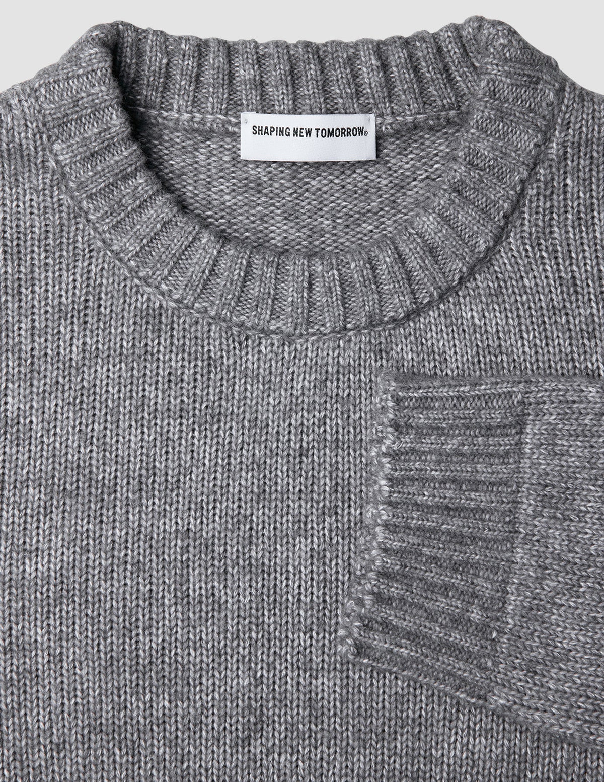 Chunky Soft Wool Knit Crewneck Glacier Grey sweater in a Scandinavian design with a ribbed neckline and cuff.