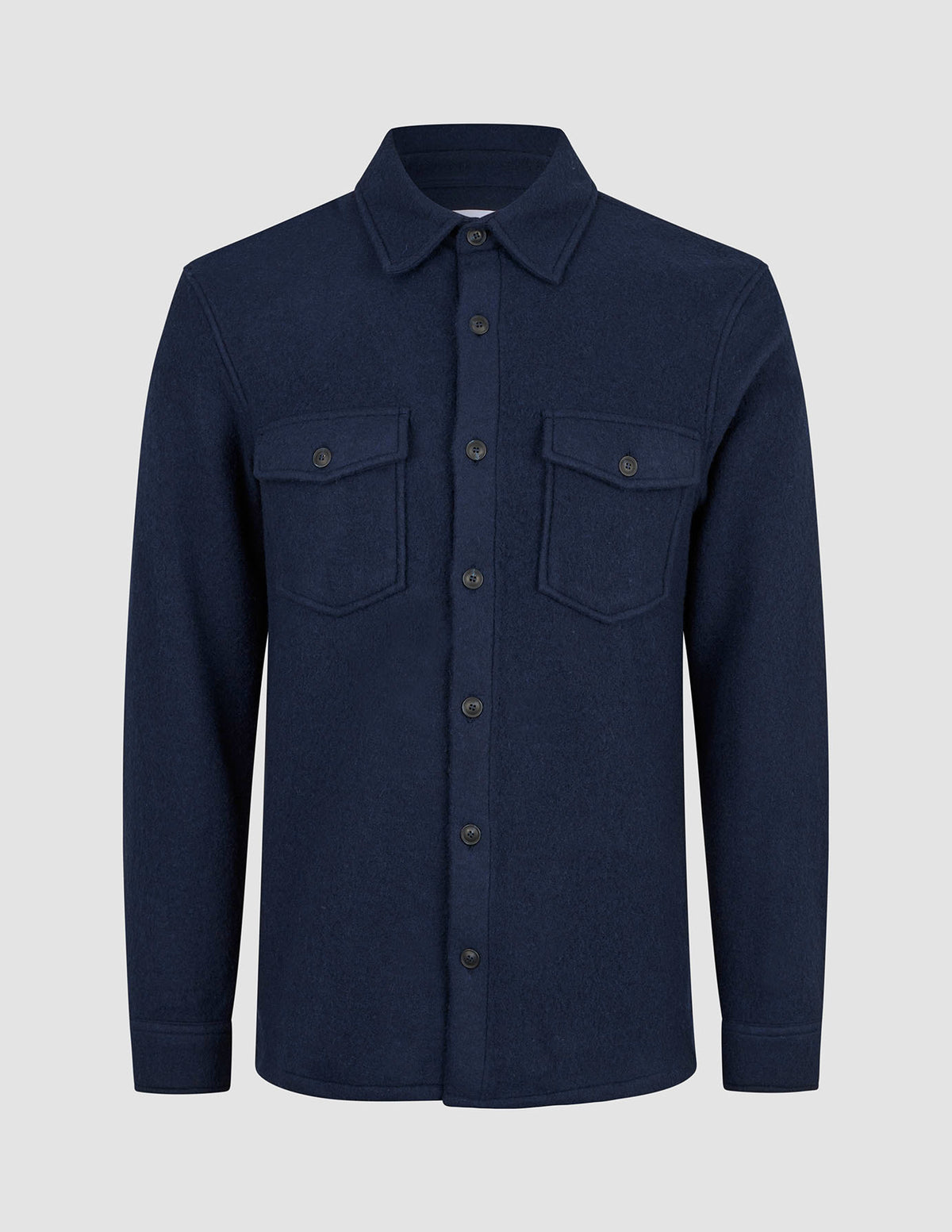 Dark navy Double Layer Wool Overshirt Regular Dark Navy featuring a collar, two chest pockets, and a long-sleeved double-layer wool design reflecting minimalist Scandinavian style.
