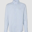 Elevated Shirt Regular Classic Blue Striped featuring an elegant long-sleeved button-down design with a light blue and white vertical stripe pattern, a standard collar, and refined Scandinavian styling.