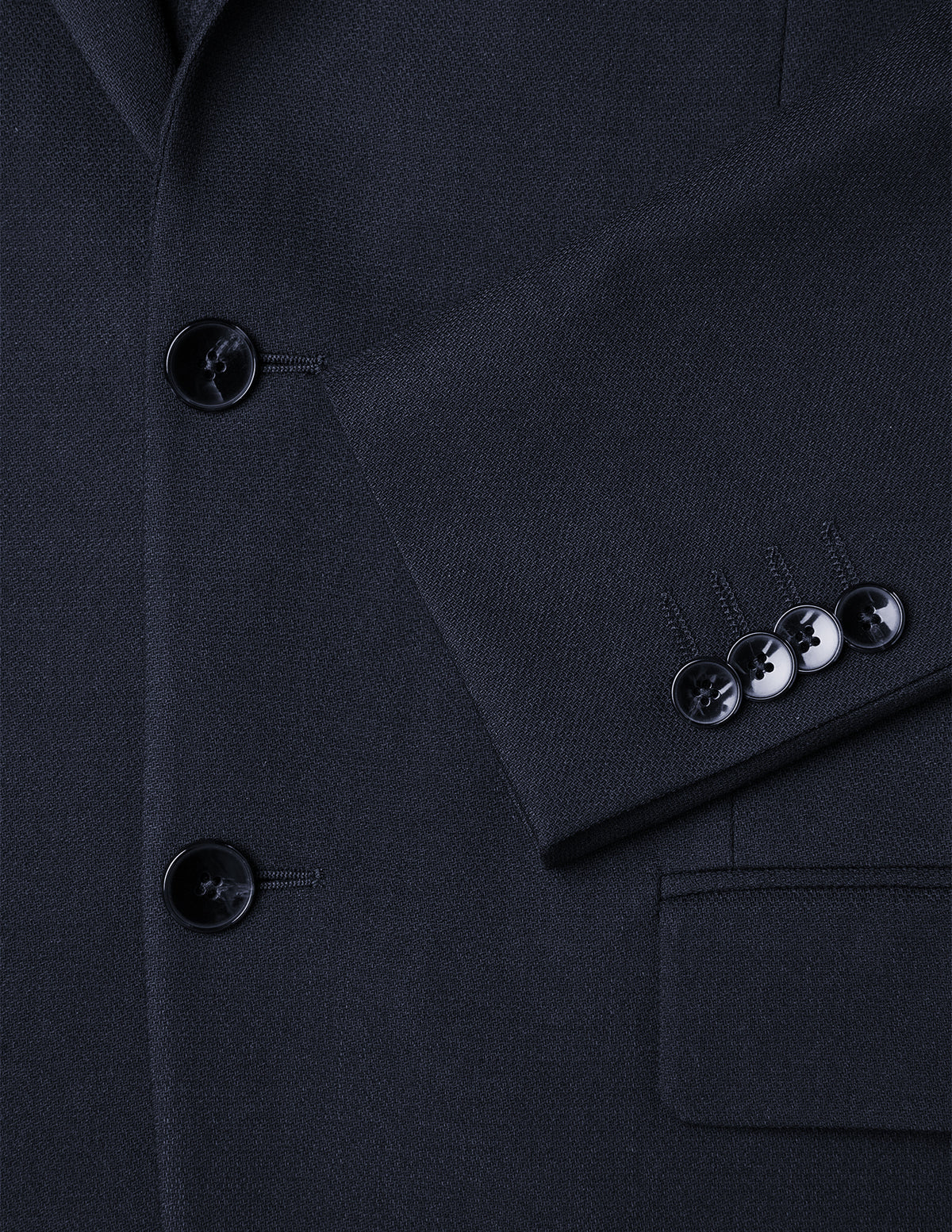 Motion Blazer Regular Midnight Blue tailored dark blue blazer featuring 360° stretch, two front buttons, a sleeve cuff with four buttons, and a welt pocket.
