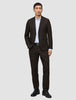 A man wearing a Motion Blazer Slim Cognac, white dress shirt, and black leather shoes.