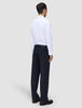 A person seen from behind wearing a white button-down shirt and Midnight Blue Motion Suit Pants Relaxed.