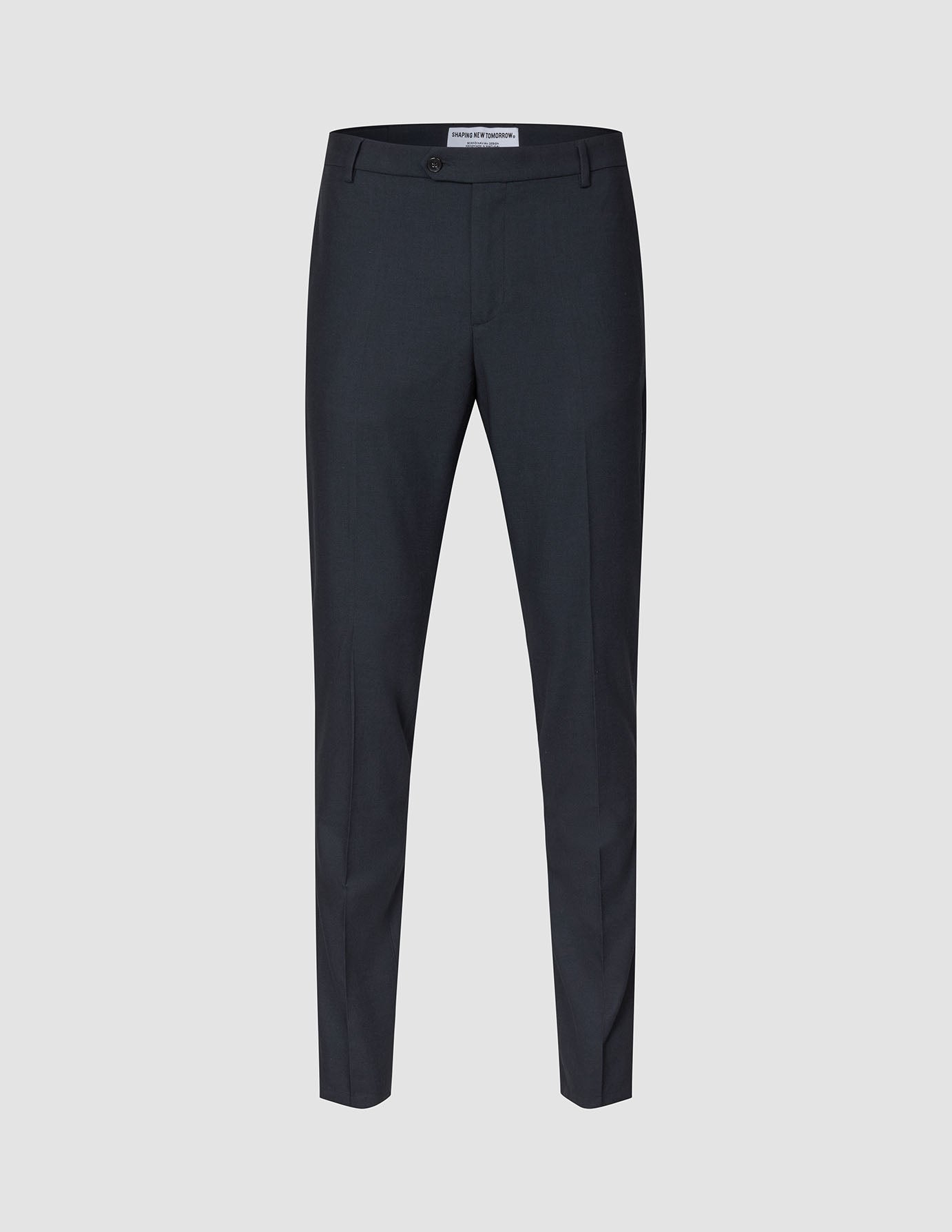 Motion Suit Pants Slim Midnight Blue slim-fit pants in dark blue with a center crease and breathable fabric.
