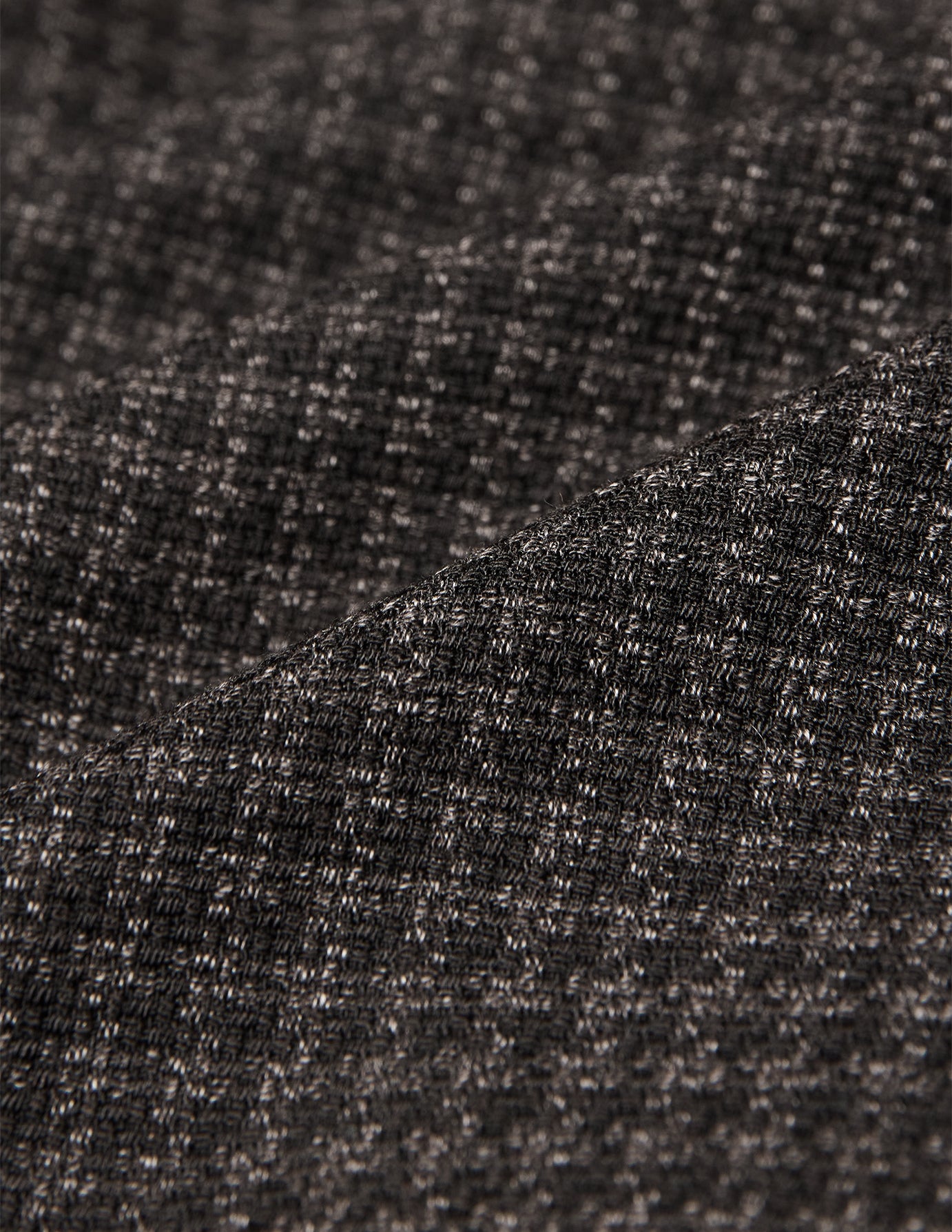 Close-up of the Timeless Wool Blazer Slim Dark Brown Check, featuring a dark brown slim fit wool blazer with a subtle checkered weave.