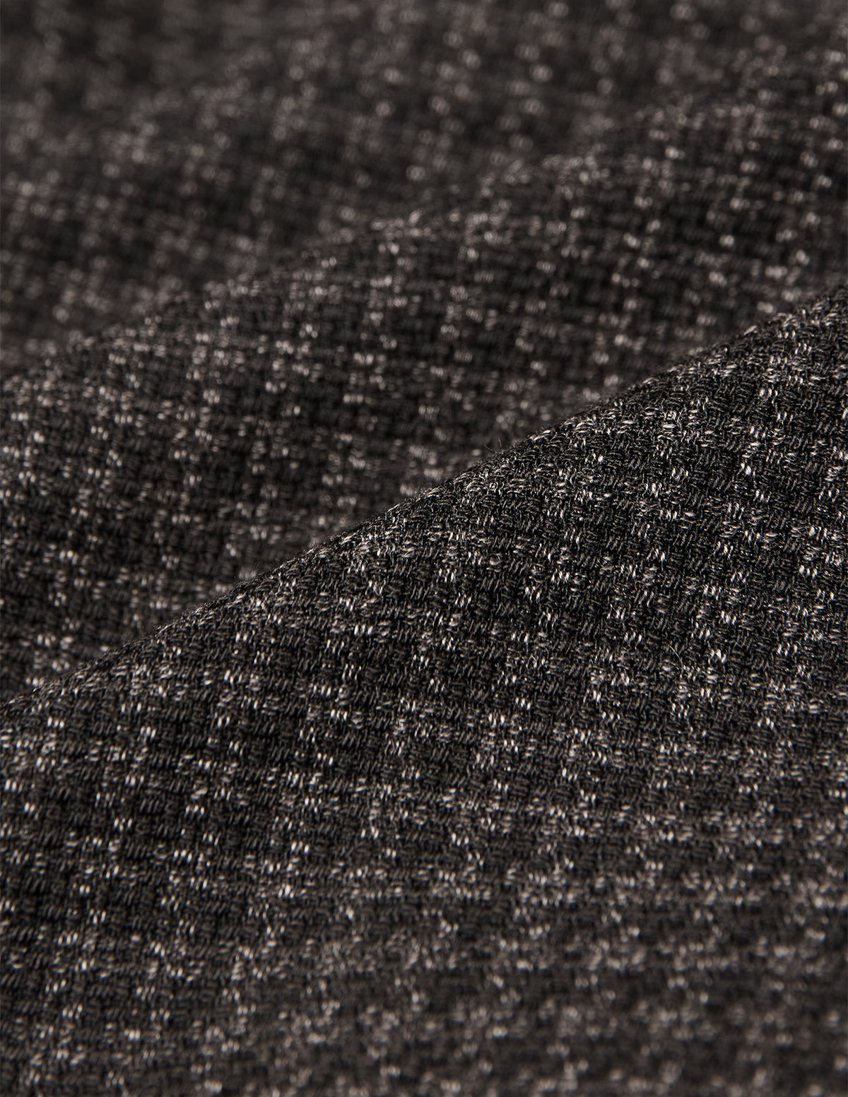 Close-up of the Timeless Wool Blazer Slim Dark Brown Check, featuring a dark brown slim fit wool blazer with a subtle checkered weave.