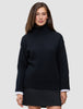 A person wearing a Women Chunky Soft Wool Knit Turtleneck Black in a Scandinavian design.