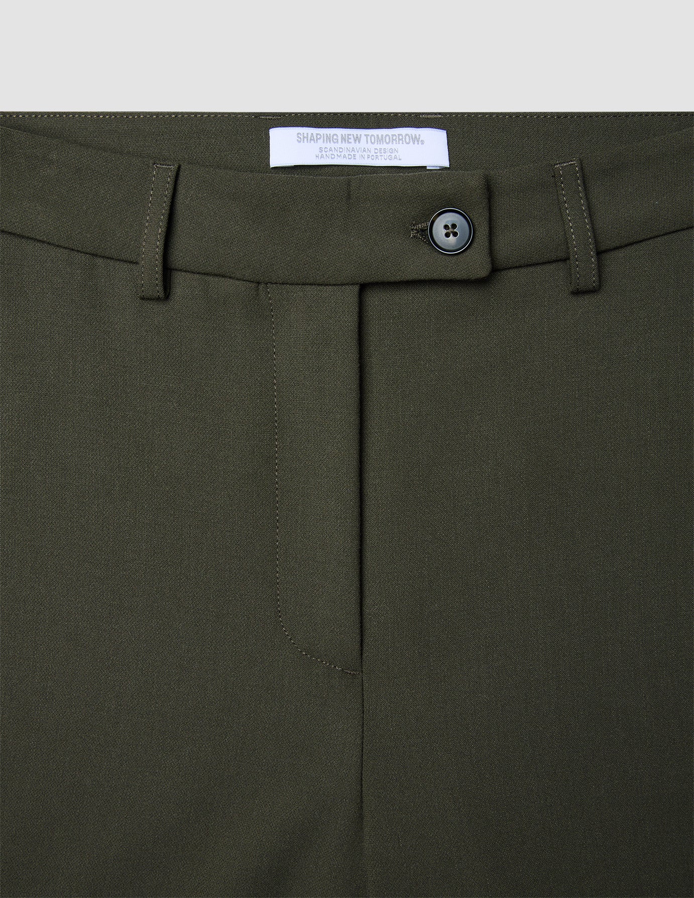Women GO2 Pants Straight Dusty Olive high-waisted trousers in olive green, featuring a front zipper, a single button closure, belt loops, and a brand label stitched inside the waistband.
