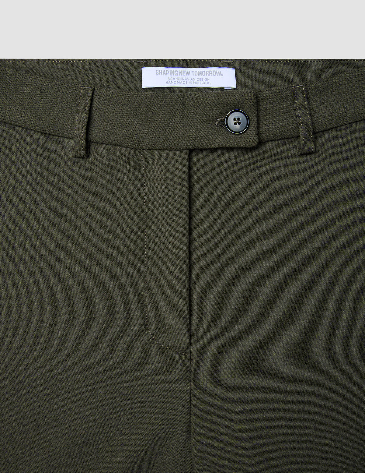 Women GO2 Pants Straight Dusty Olive high-waisted trousers in olive green, featuring a front zipper, a single button closure, belt loops, and a brand label stitched inside the waistband.