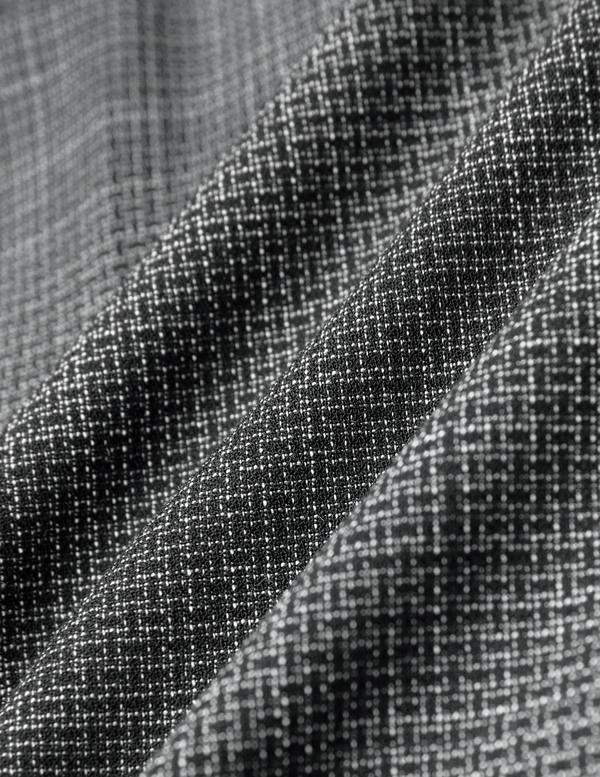 Black and white checkered fabric of Women Nara Pants Wide Black Check with visible folds.