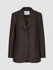 Women Serene Blazer Regular Walnut Herringbone in brown wool with a herringbone texture, two front buttons, and flap pockets in a classic Scandinavian design.