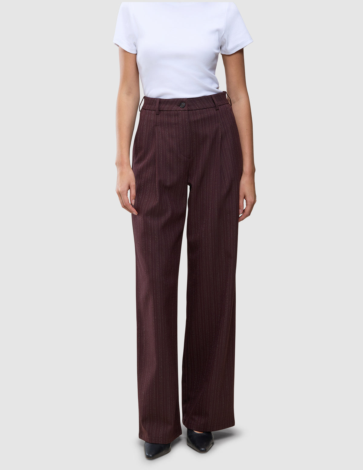Women Serene Pants Wide Berry Pinstripe are high-waisted, wide-leg trousers in a dark berry color with thin vertical pinstripes, featuring a minimalist Scandinavian design.